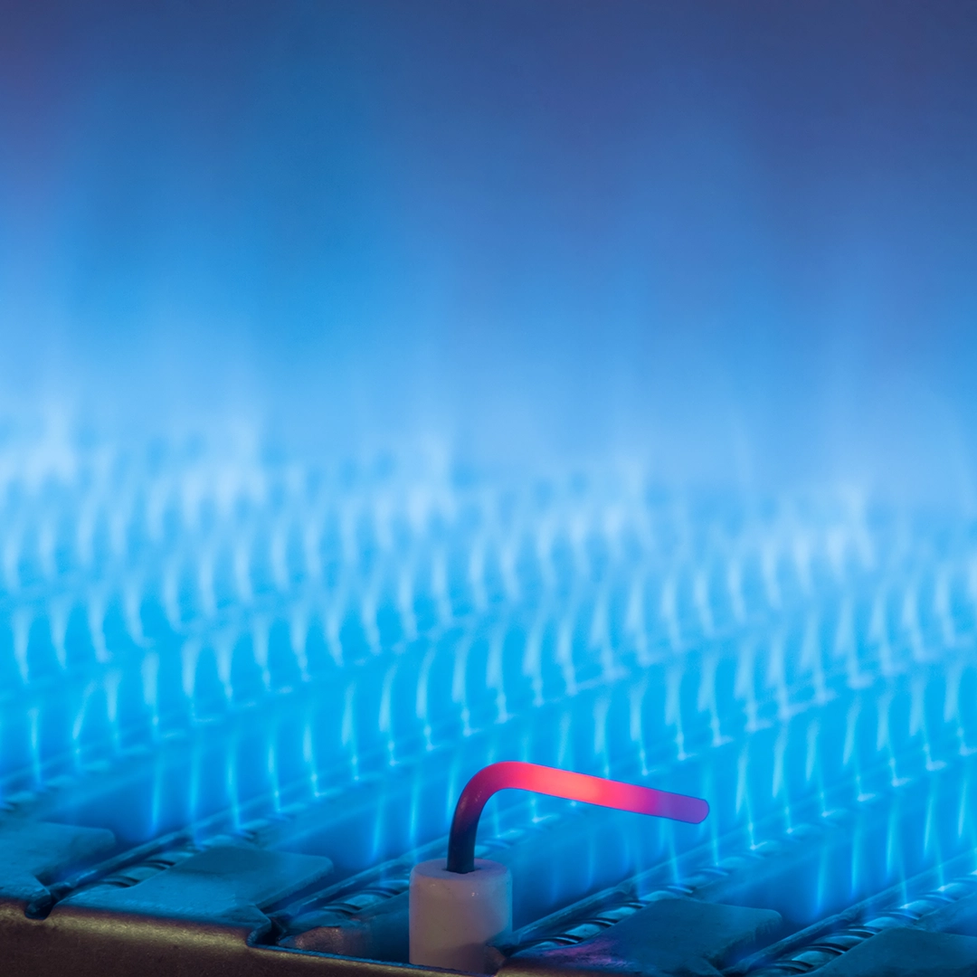 Gas flames inside a boiler for heating services