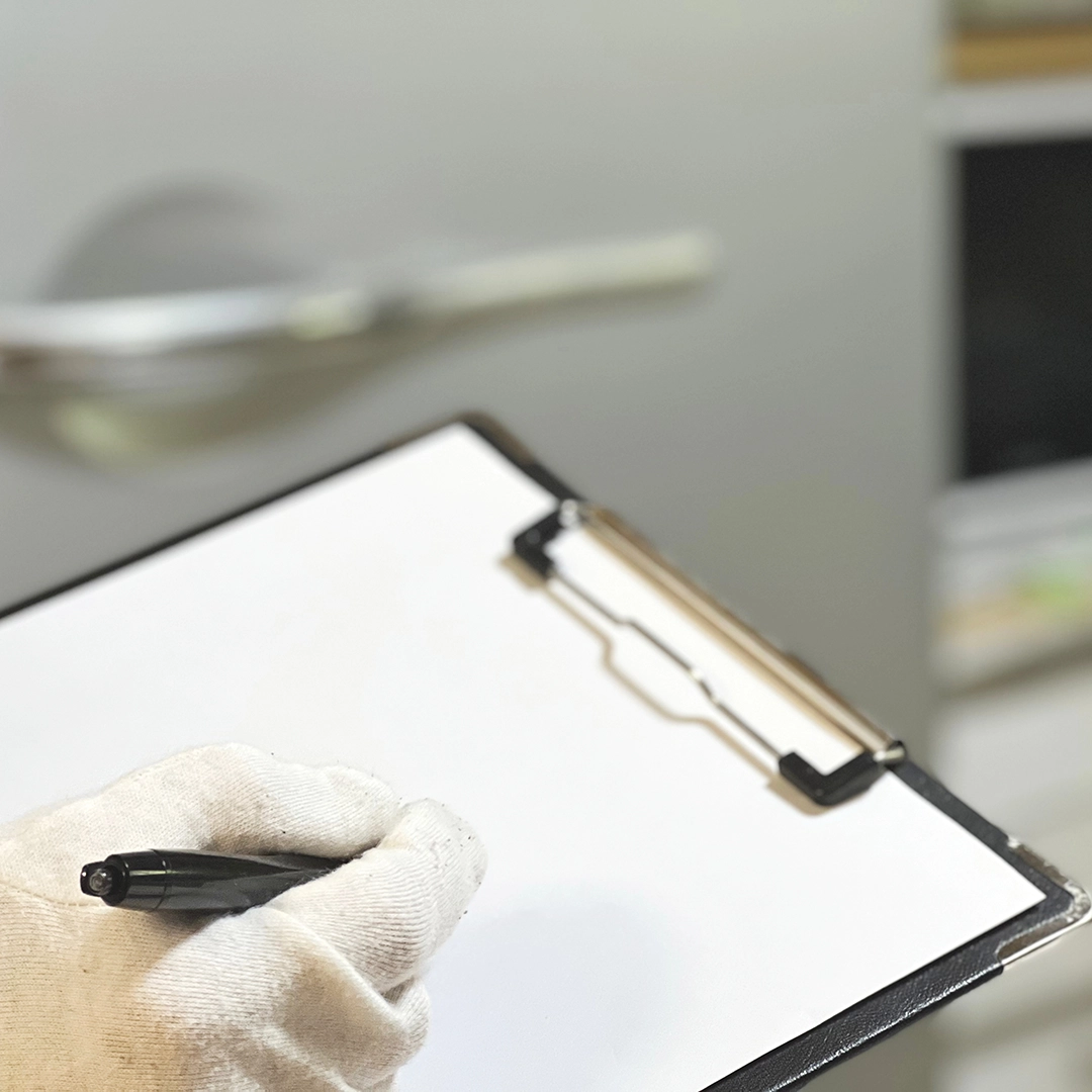 Person with a clipboard taking notes for an EPC