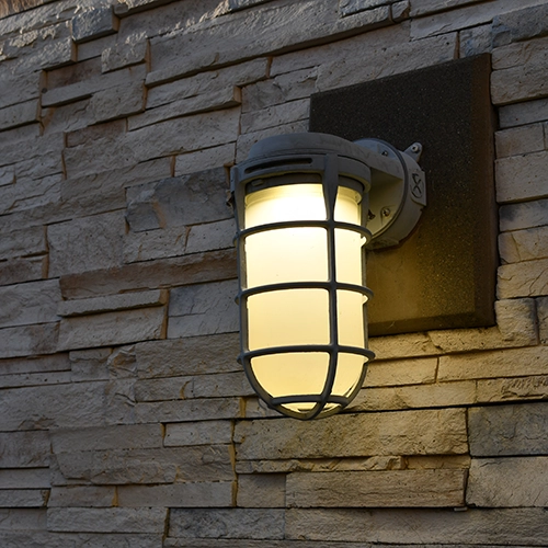 Outdoor light attached to a wall