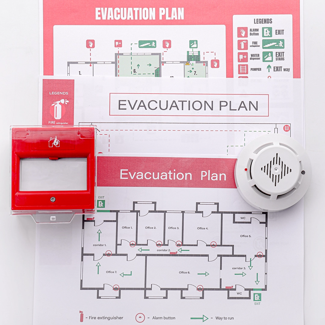 Evacuation Plan diagram with a fire alarm button and a fire alarm device
